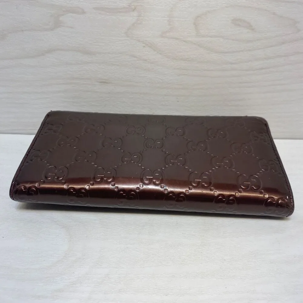 Gucci Shiny Guccissima Lovely Heart Continental Wallet in metallic burgundy - Picture 2 of 13